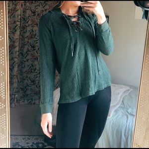 Green hooded sweater